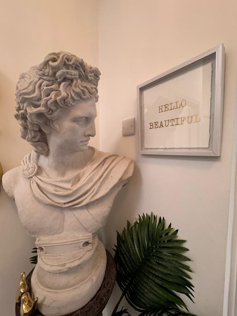 Clinic interior detail with a Hello Beautiful sign