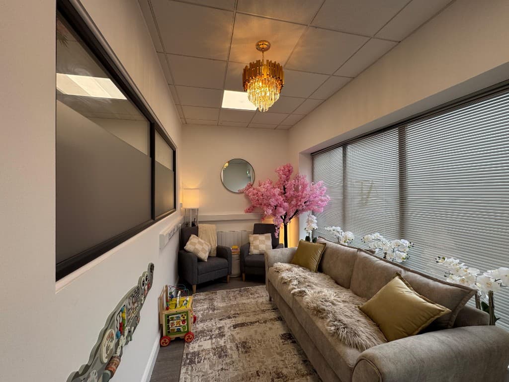 Clinic waiting area with seating and soft lighting