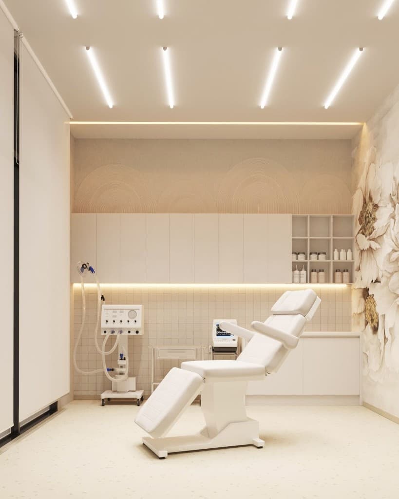 Luxury treatment room with professional aesthetic equipment